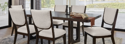 Dining room chairs and table on rug