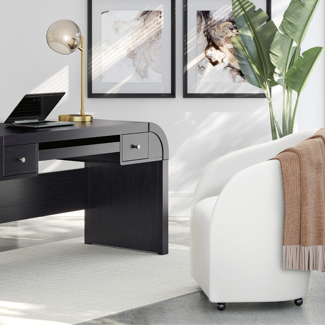 curved black desk and curved chair