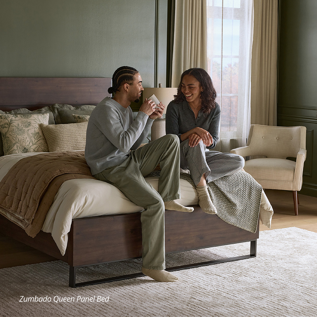 couple chatting in bedroom