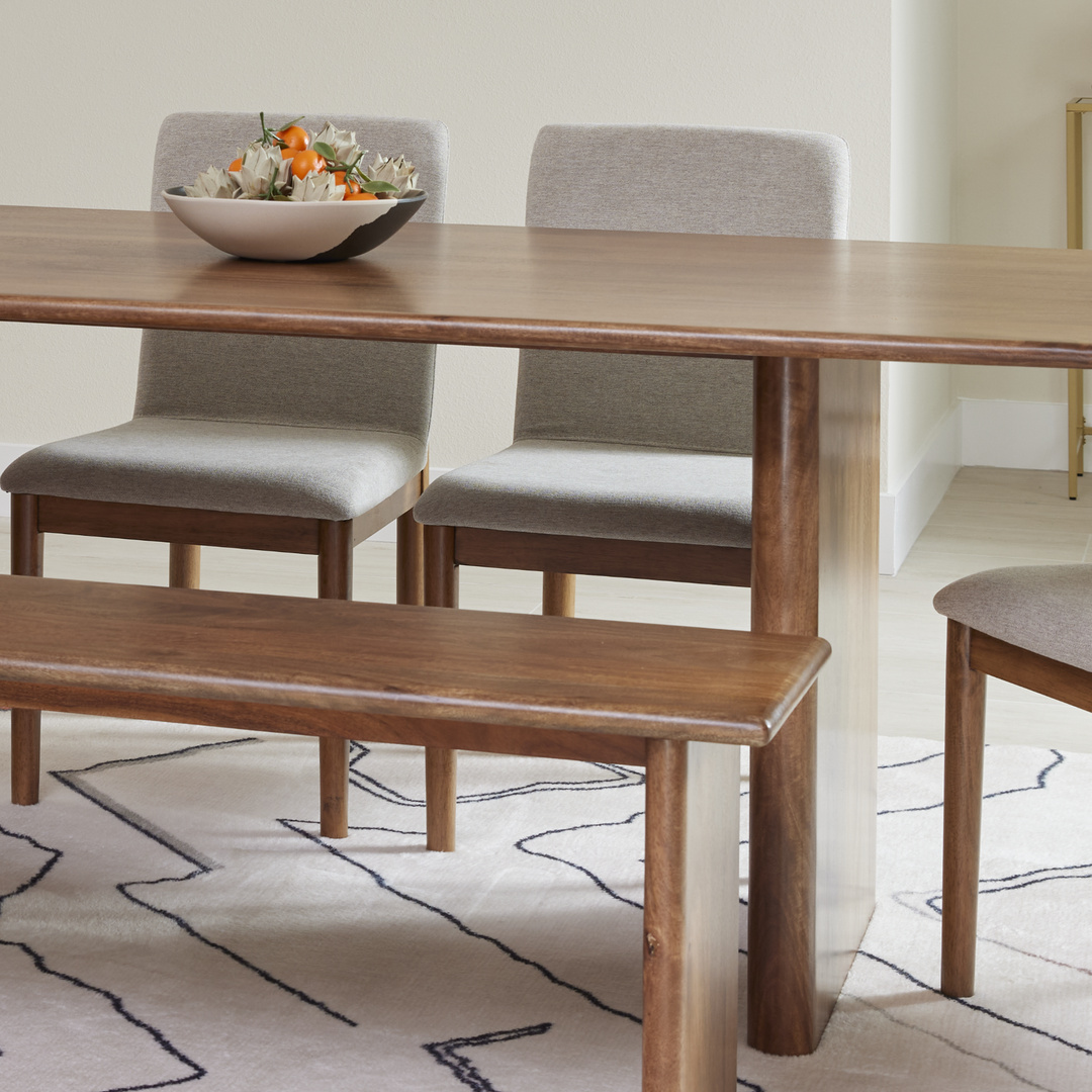 dining room set with chairs and a bench