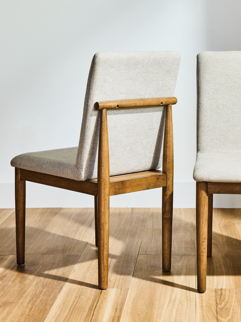 light grey seat with wood chair
