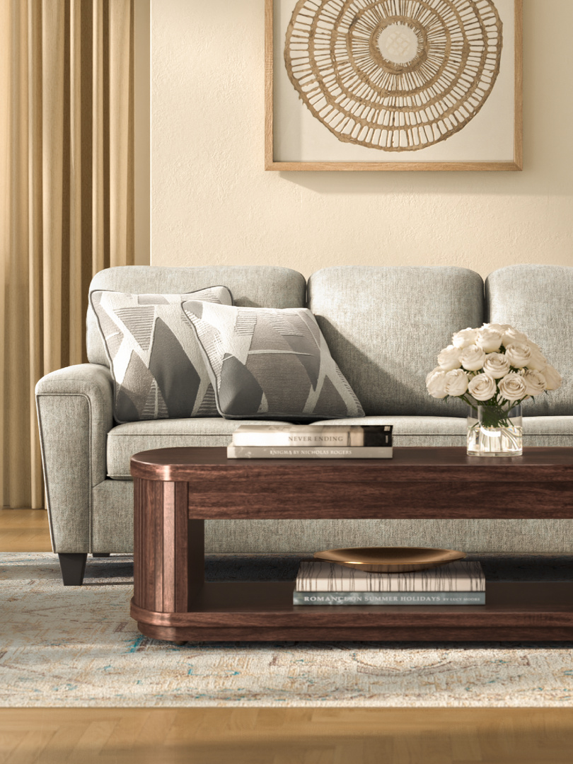 grey sofa with flowers on coffee table