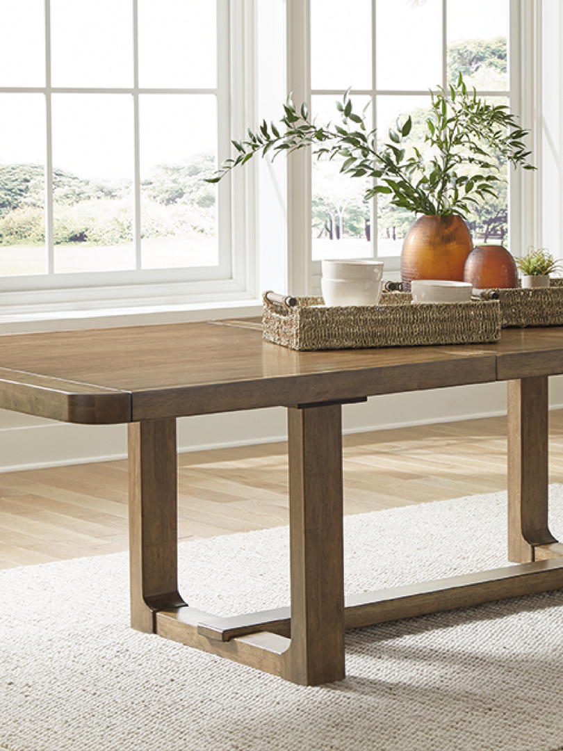 brown wooden dining table with trays