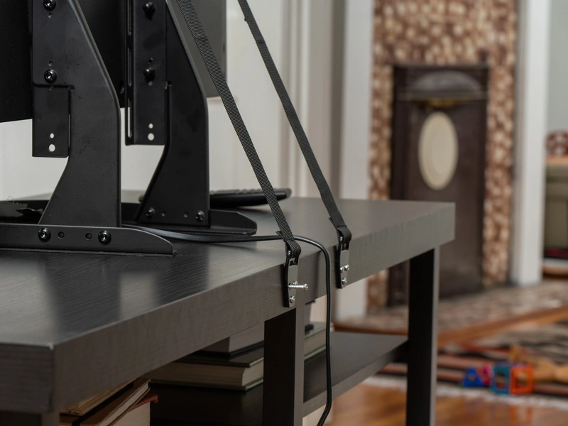 TV anchor mount on entertainment center