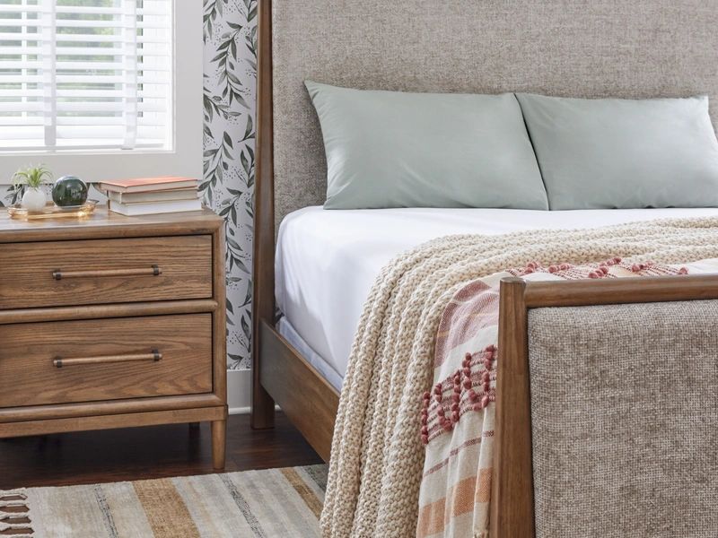 lifestyle image of bedroom with bed and nightstand