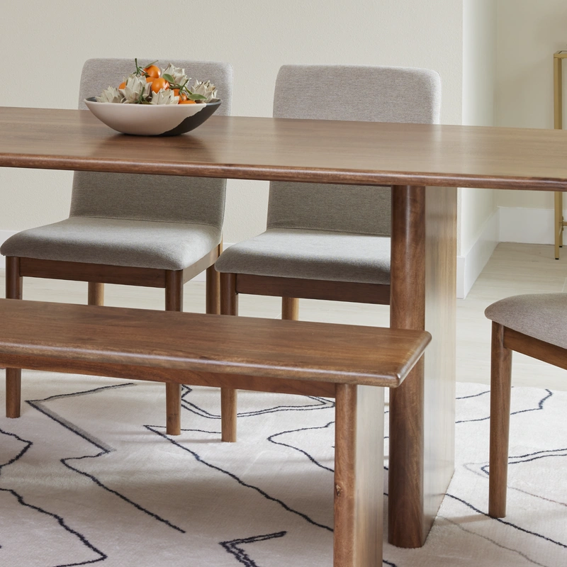 dining room set with chairs and a bench