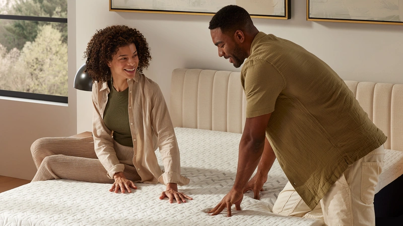 couple laying on bed